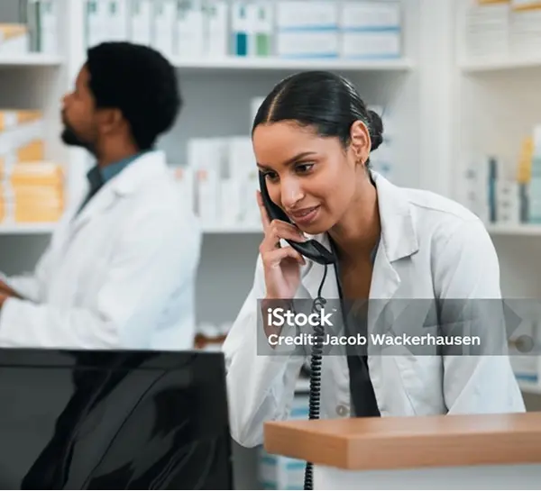 Pharmacist talking on phone