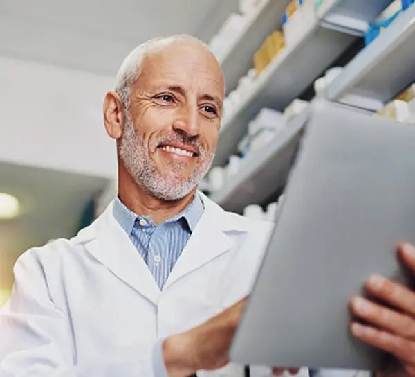 Pharmacist looking at a clipboard